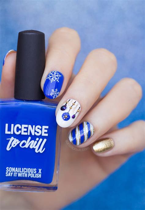 blue and gold christmas nails